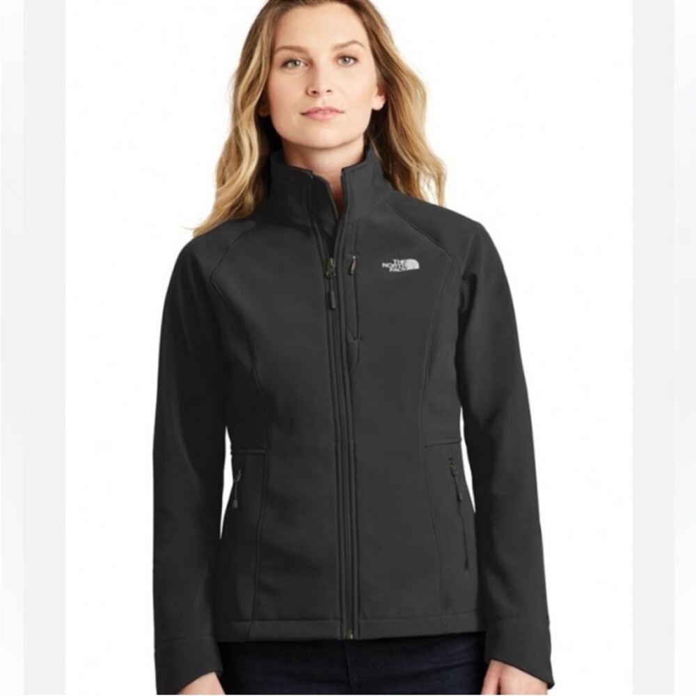The North Face Black Jacket with High Collar and Slim Fit. Windwall.